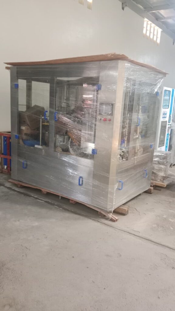 Atlas Automatic Rinsing, Filling & Capping Packaging Equipment.